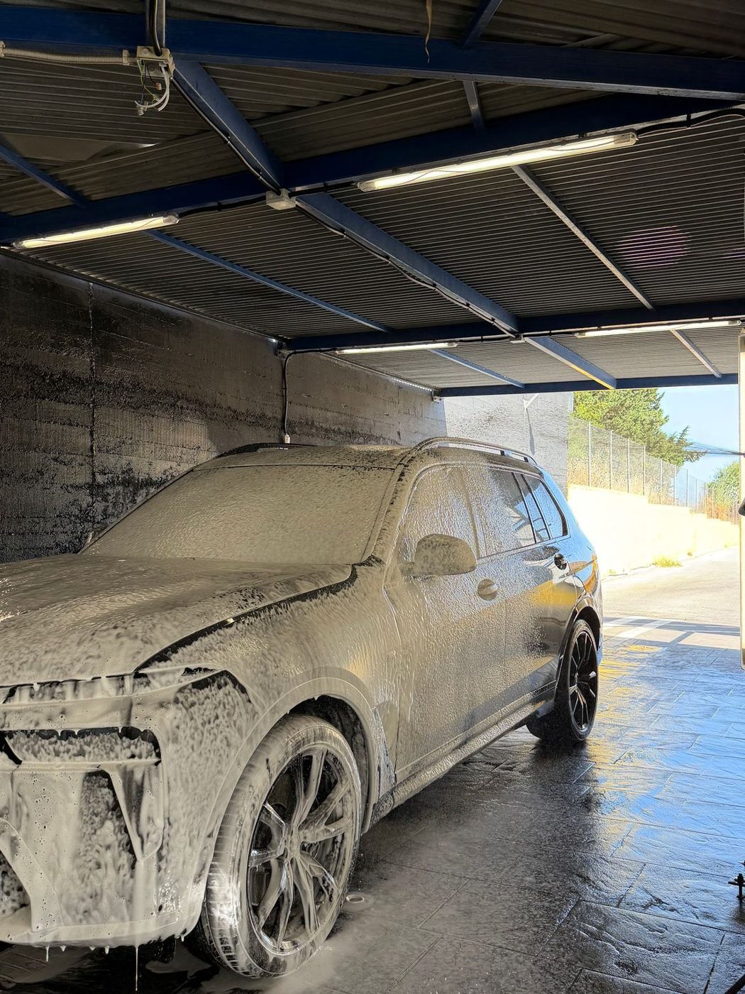 Car in foam during detailing